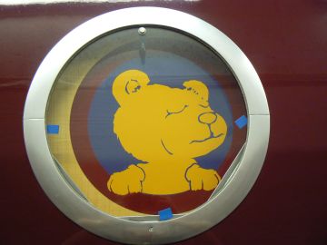 photo of shower-room porthole graphic