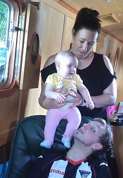 photo of aria with Mum and Dad