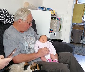 photo of Jade in Grandad's arms