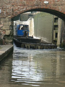 photo of barge stuck in Stenson Lock